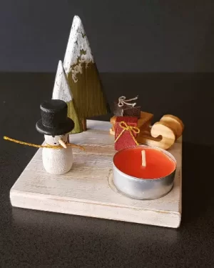Composizioni natalizie con candele